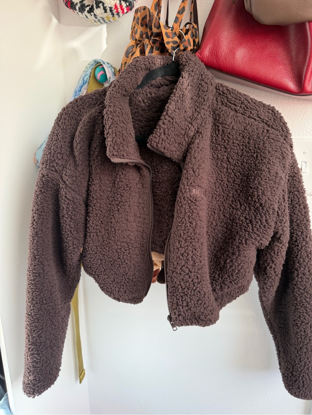 SKIMS Cropped Teddy Jacket in Dark Brown